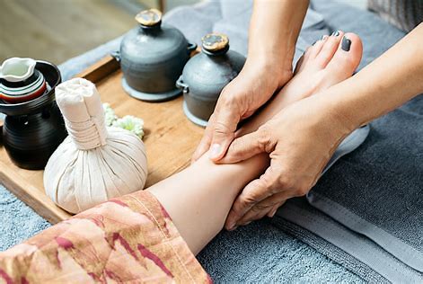 Thai massage with herb poultice.